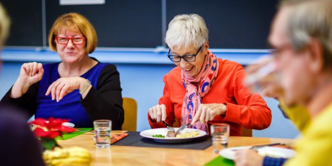 The Tavolata community eating together