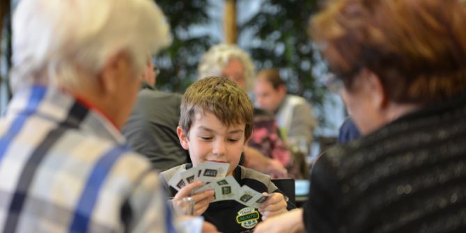 Boy playing Jass for All Ages